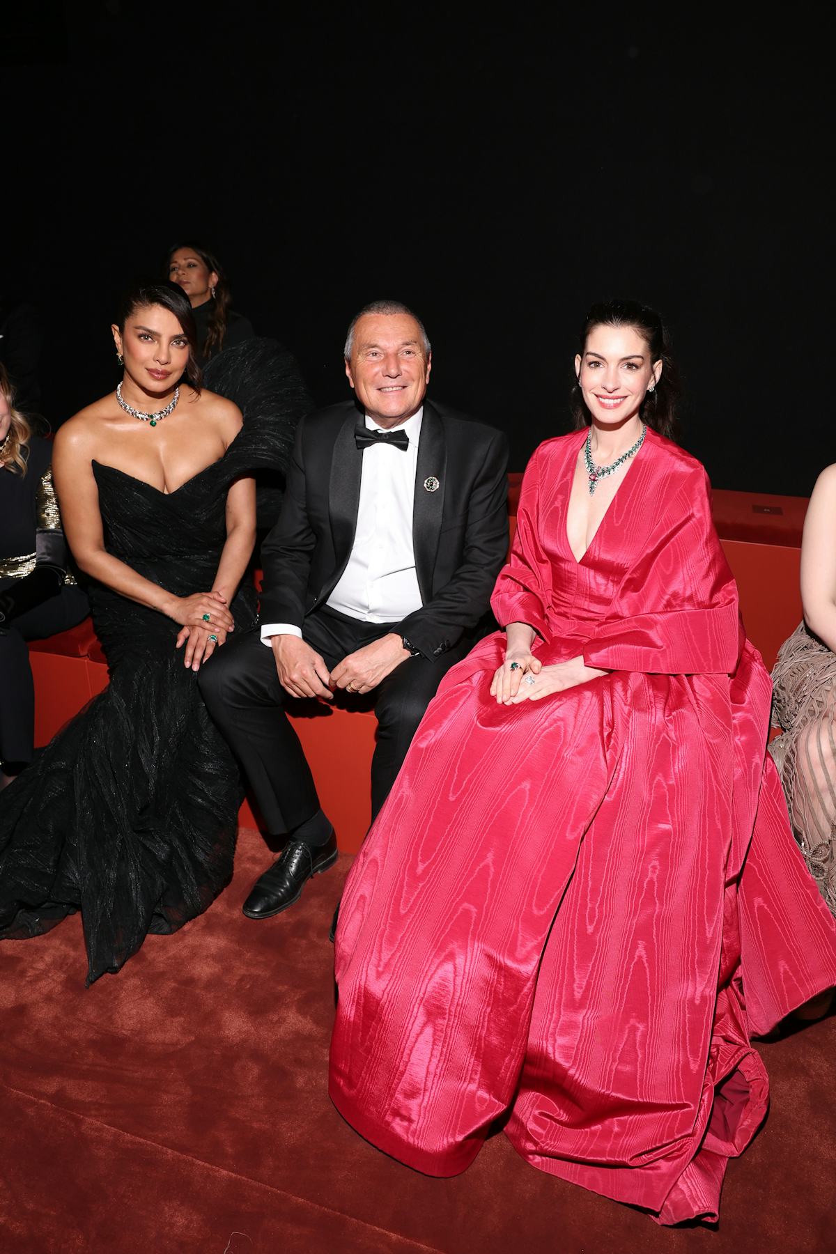 Anne Hathaway Gives Valentino Red the Princess Treatment With Dazzling Bvlgari Jewels