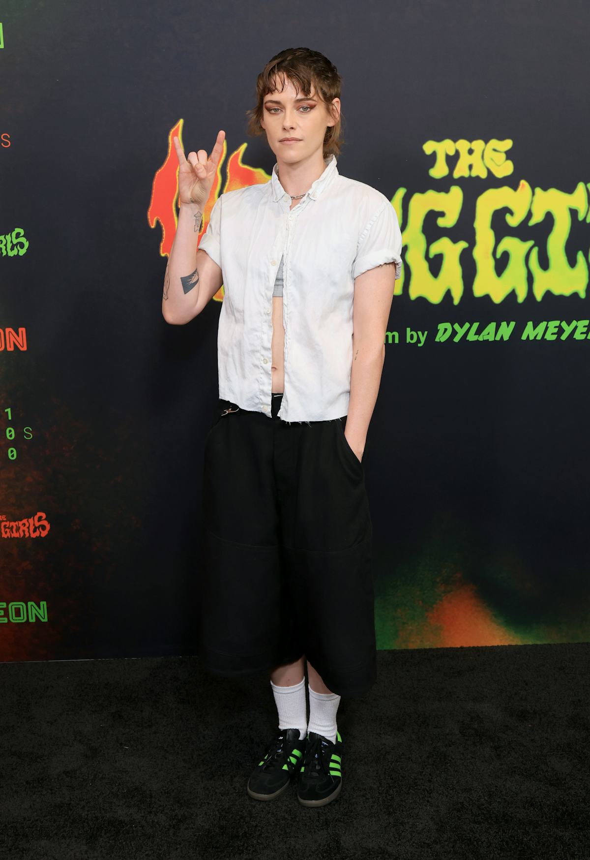 Kristen Stewart Pairs a Luxe Leather Dress With Men’s Sneakers